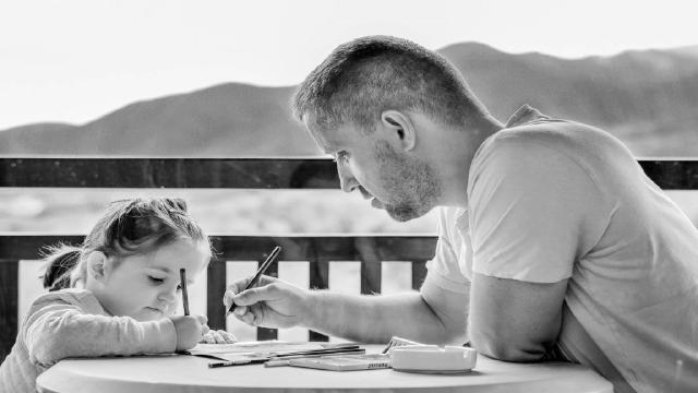 father and daughter on Father’s Day coloring together